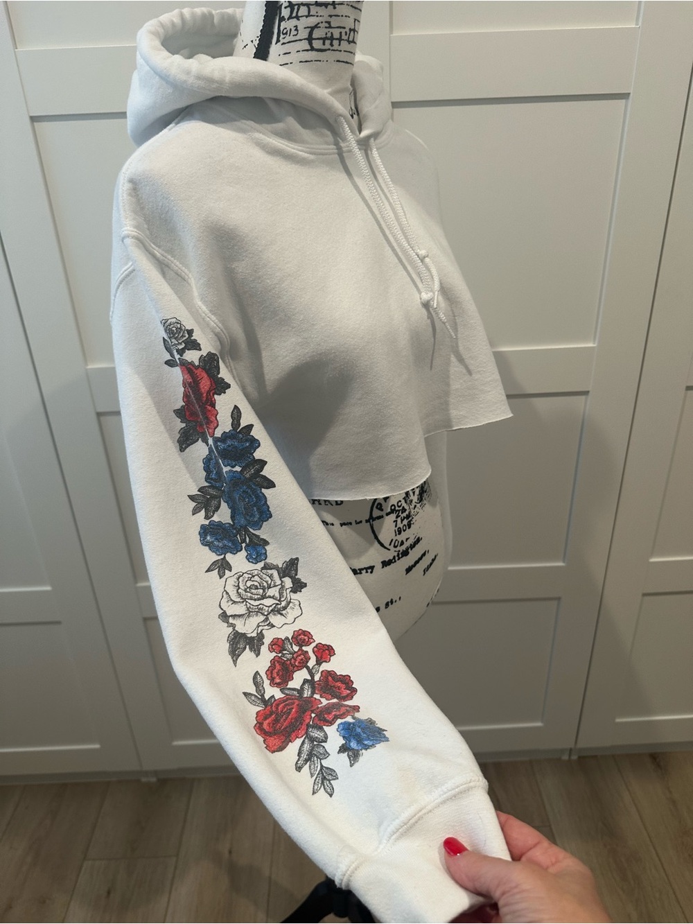 White Cropped Hoodie with Red & Blue Floral Sleeve size Small